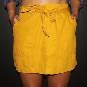 yellow skirt with tie around waist